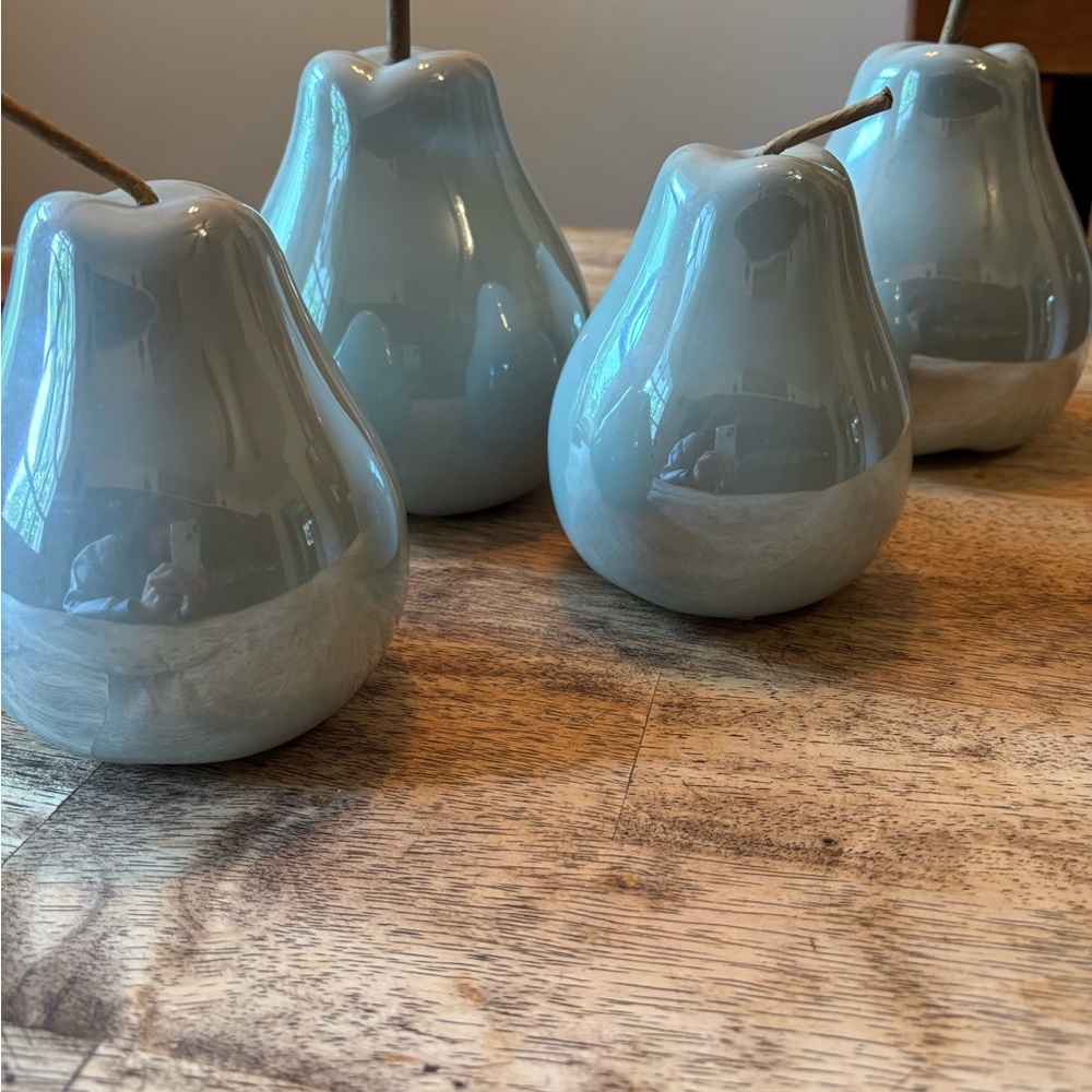 Four Light Blue Decorative Pears. These are a sweet tabletop or shelf addition.